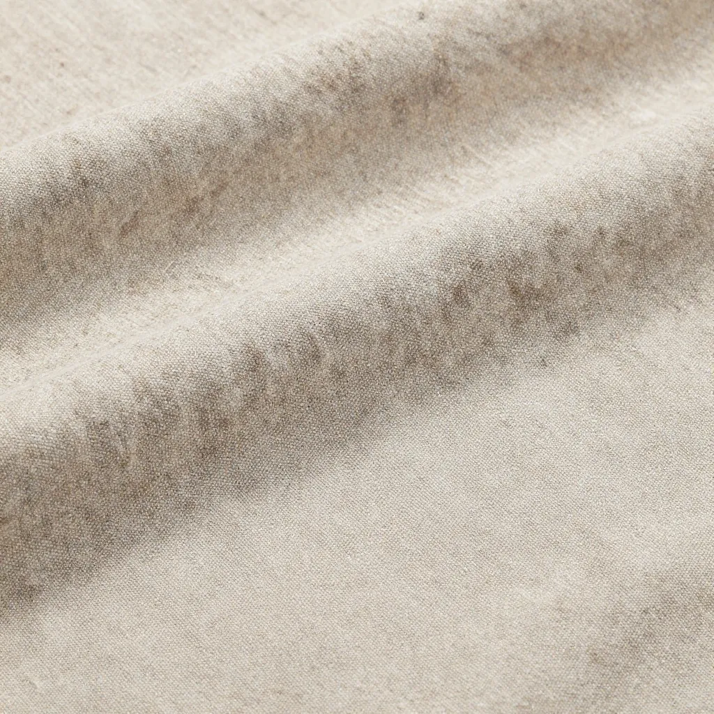 Mid-century modern living room with natural fabric treatments